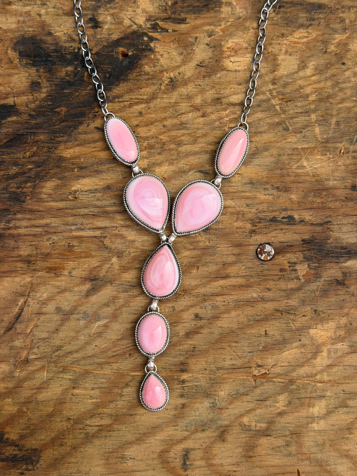 Pink conch lariat